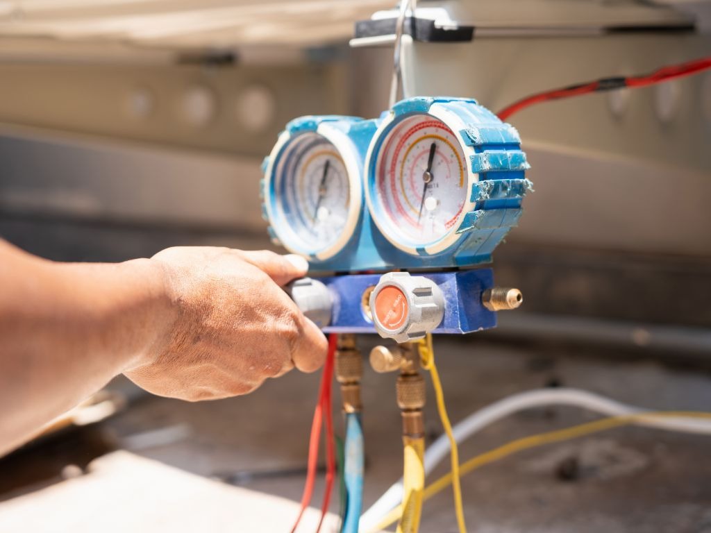 Summit Cooling team installing HVAC equipment